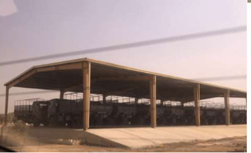 A&A Enterprises Engineering — long-span steel shed with vehicles