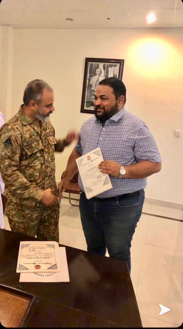 Mastoor Group — receiving a certificate of appreciation from a Pakistan Army officer