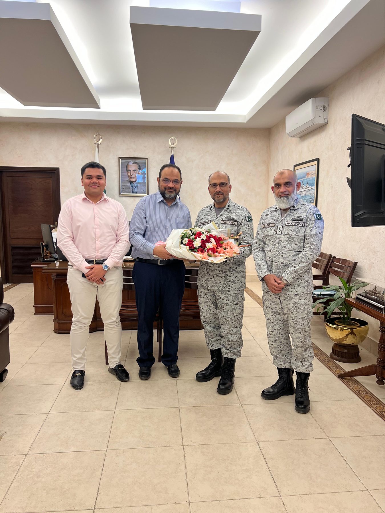 Mastoor Group — flowers presented to Pakistan Navy officers by leadership